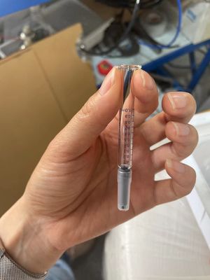 Machine de bouchage de remplissage sous vide à dépilage automatique pour seringues préremplies