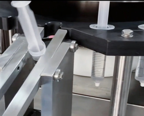 Machine automatique de remplissage par capuchon à gel de seringue préremplie jetable en plastique