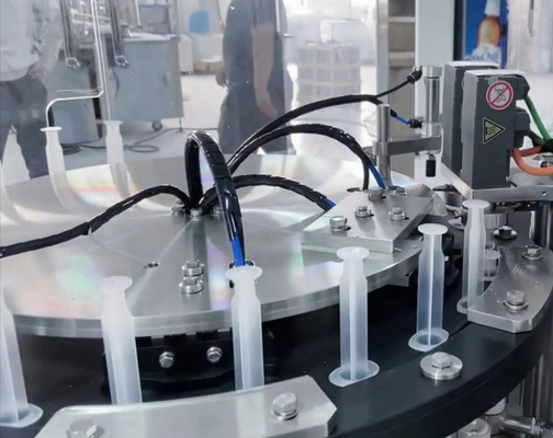 Machine automatique de remplissage de la seringue pré-remplie au gel liquide, de l' étiquetage de la capsule et de l' étiquetage de l' injection