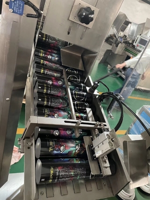 Machine de remplissage et d'étanchéité de tubes souples à écran tactile avec système d'alimentation automatique des tubes