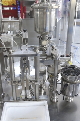 Machine automatique de remplissage de seringues en verre et machine de boucle pour pommade
