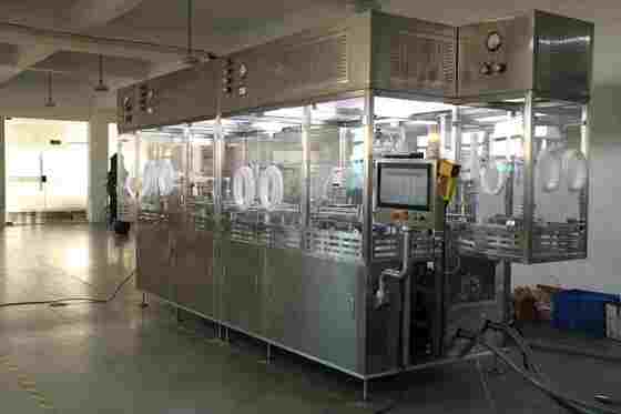 Machine de remplissage de seringues préremplies RTU automatisée à haute vitesse pour la fabrication stérile