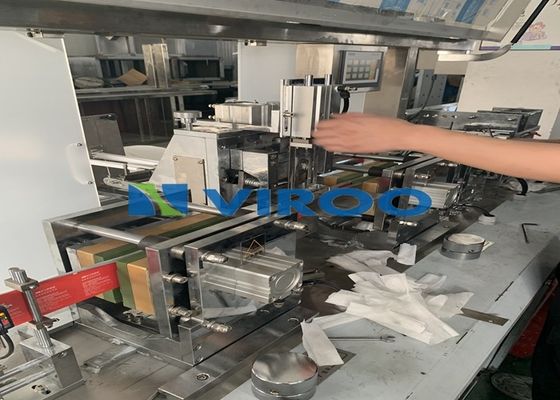 Quatre chiffons humides médicaux se pliants de machine à emballer de tissu humide latéral